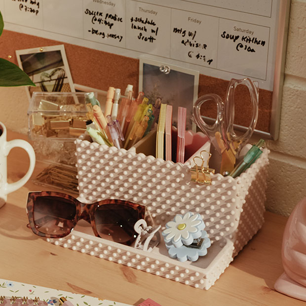 Pencil holder and supplies on desk